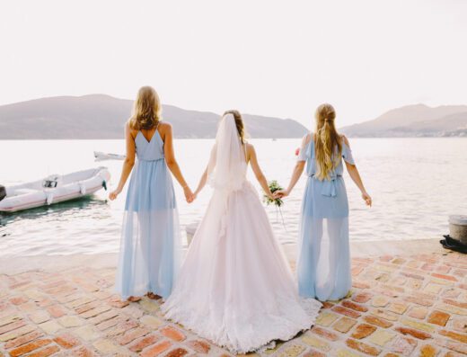 bridesmaids and bride on beach